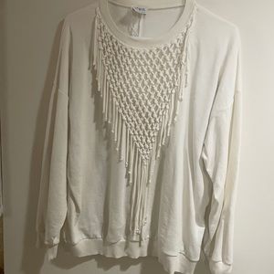 Zara white sweater.